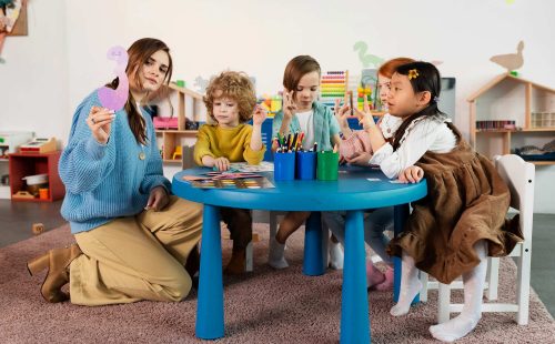 full-shot-kids-sitting-together-table