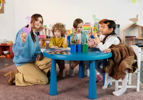 full-shot-kids-sitting-together-table